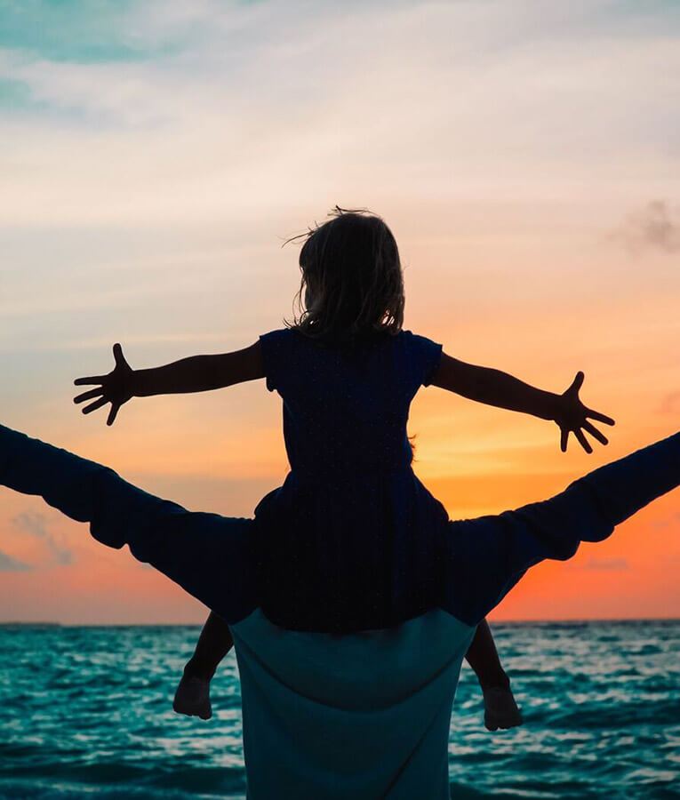 Family enjoying sunset together